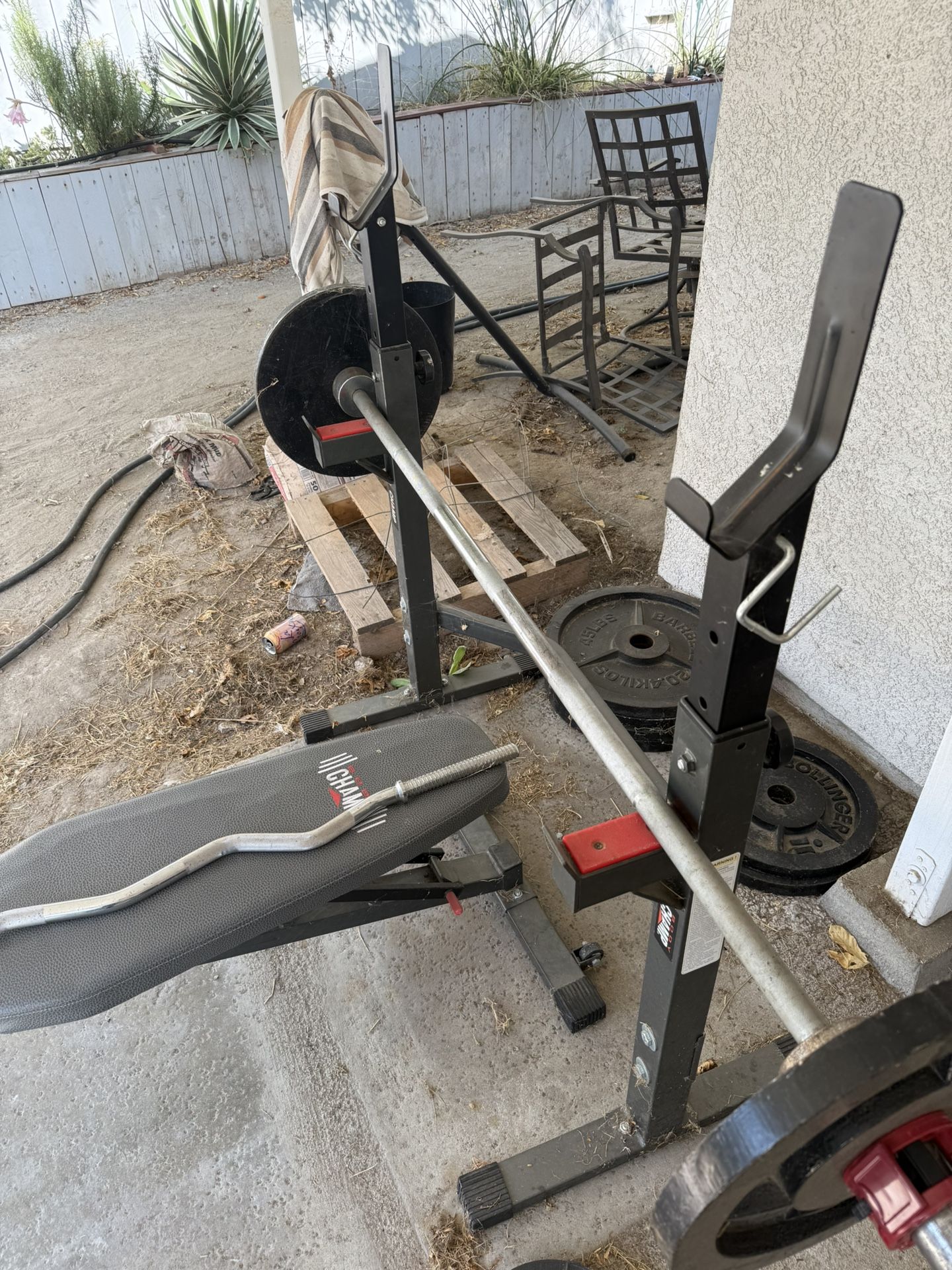 $300 Total: 4x45s, 4x35/Bar, Bench, Rack, Curl Bar