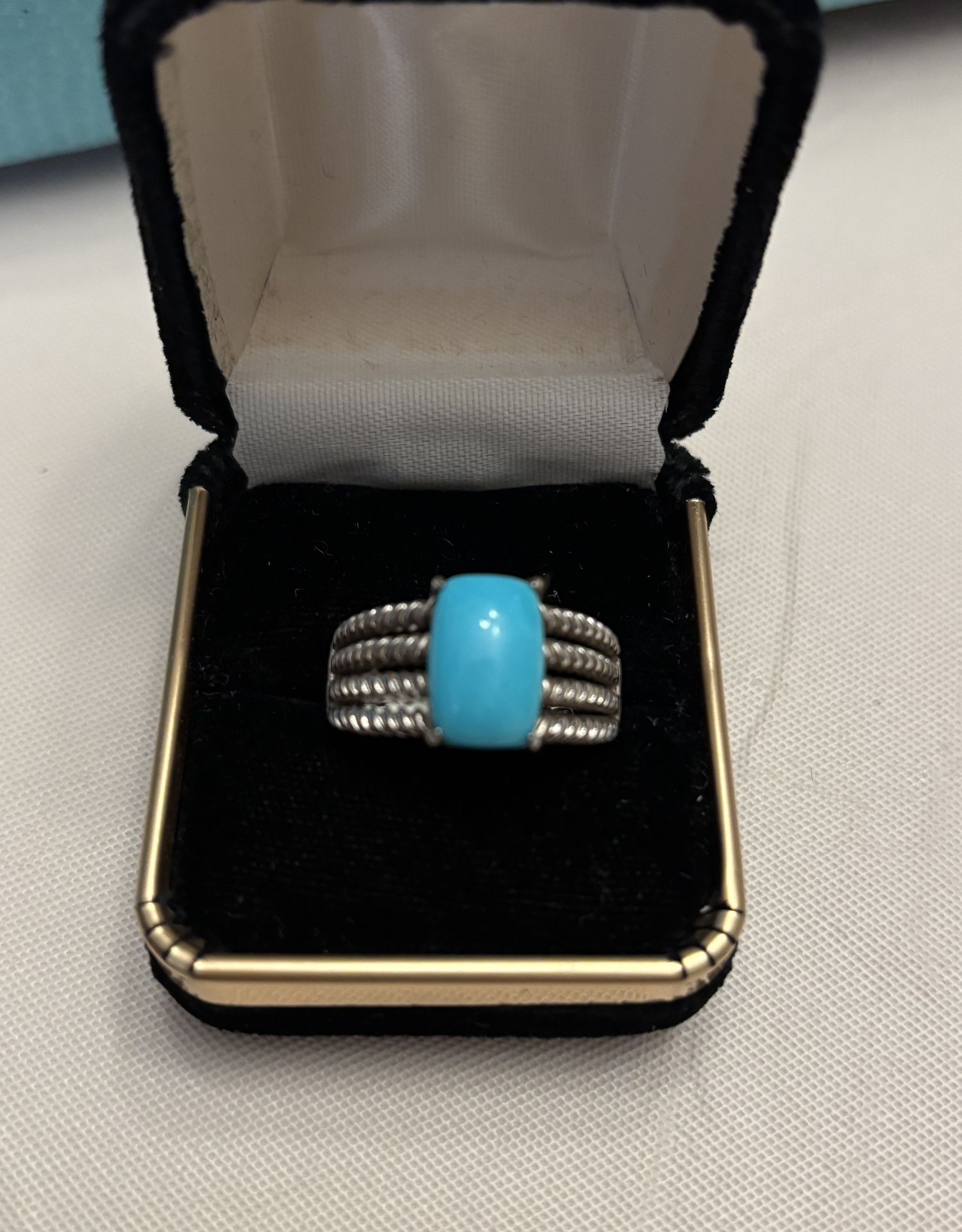 Sleeping Beauty turquoise set in a sterling silver ring.