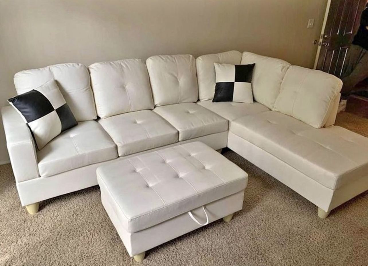 White Leather Sectional Couch And Ottoman