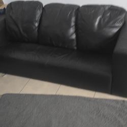 Leather Sofa And Love Seat  New Condition 