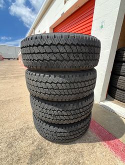 LT275/65/R20 Bridgestone dueler all-terrain 10 ply load range E Chevy Gmc Ford Rims