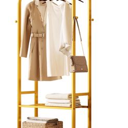Heavy duty metal clothes rack with shelves in gold