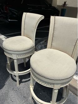 Pair of Elegant Louis XVI Style Swivel Bar Stools - Distressed Ivory, Upholstered, Nailhead Trim