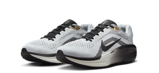 Size 11.   NIKE  Air Running Sneakers White Black Gold