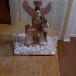 Religious centerpiece uses for baptism or first communion