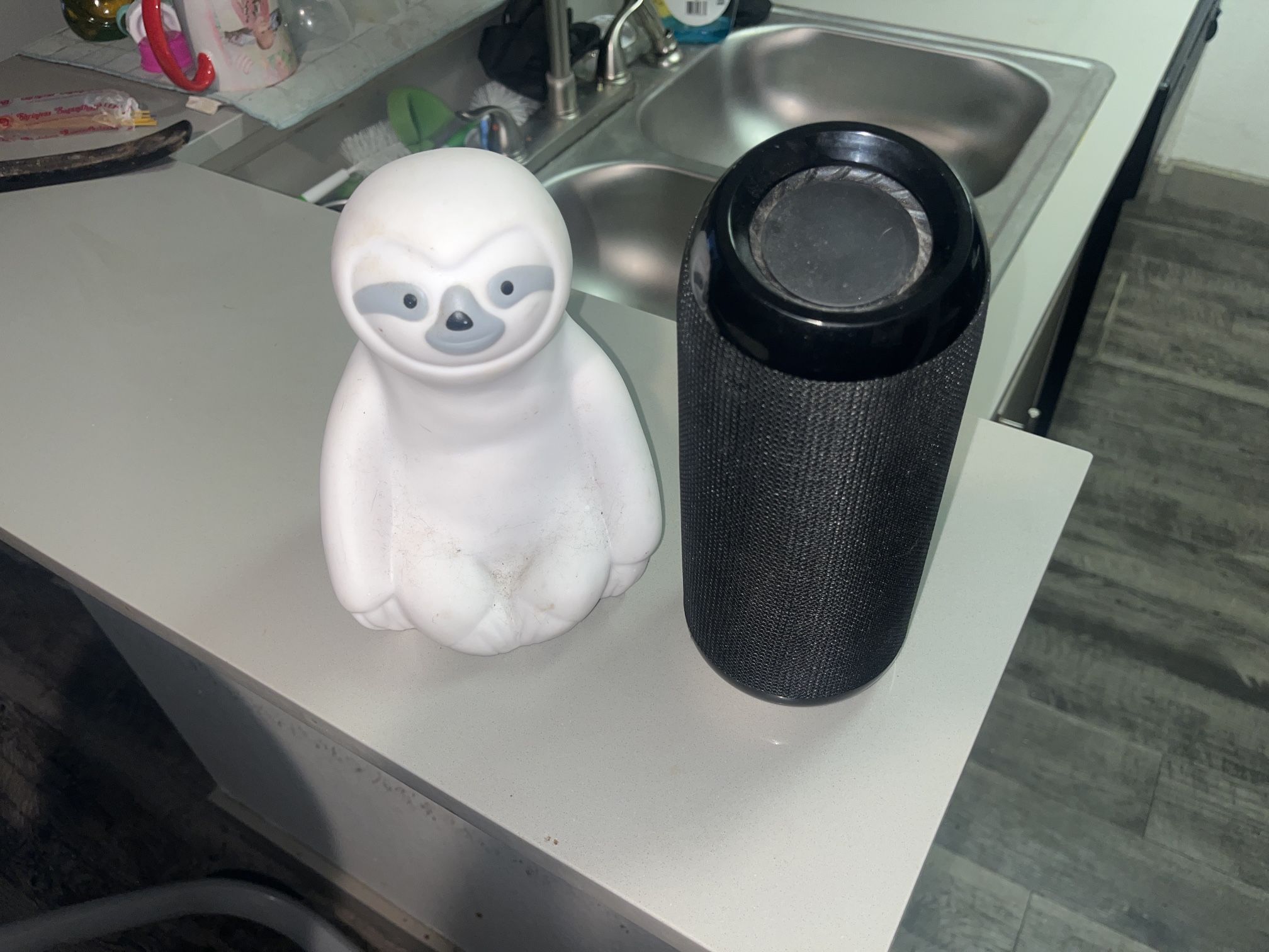Bluetooth Speaker (Black, cylinder style) & Sloth Bluetooth Speaker (White, novelty)