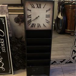 hanging clock with storage slots