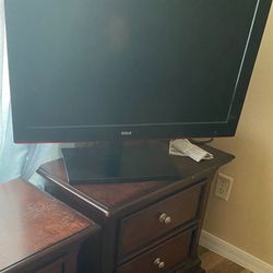 Tv With Roku  And Stand