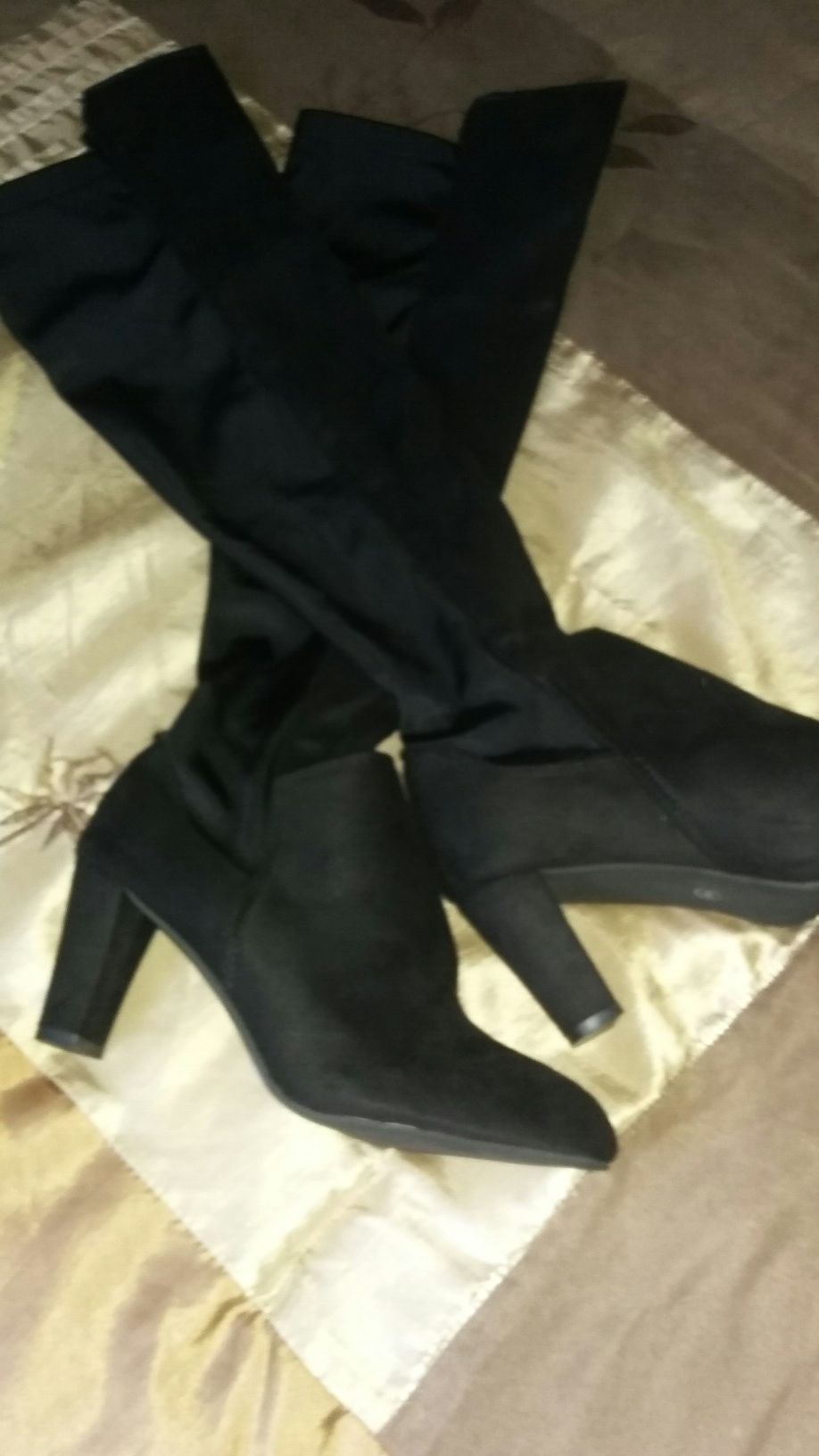 Brand new thigh-high boot size 9