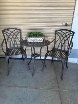 Heavy patio set table and 2 chairs