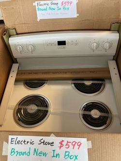 Brand new electric stove in box