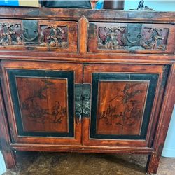 carved wood cabinet