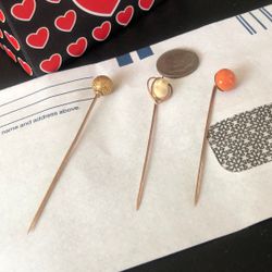 18 karat and 14 karat antique tiepins