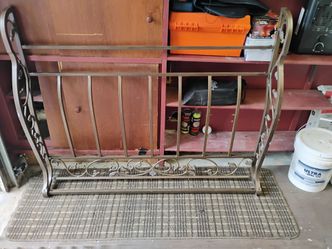 Free Queen decorative metal head board. Attaches to any universal bed frame