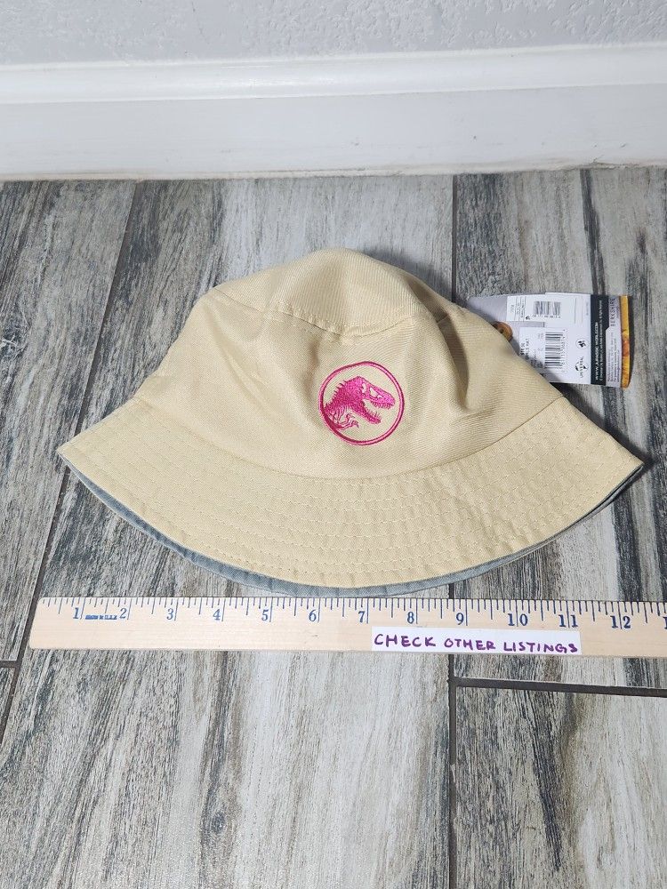 Youth Girls' Jurassic World Wide Brim Reversible Bucket Hat One Size A260
Pink Jurassic logo
New with tag,  Genuine Universal studio license product