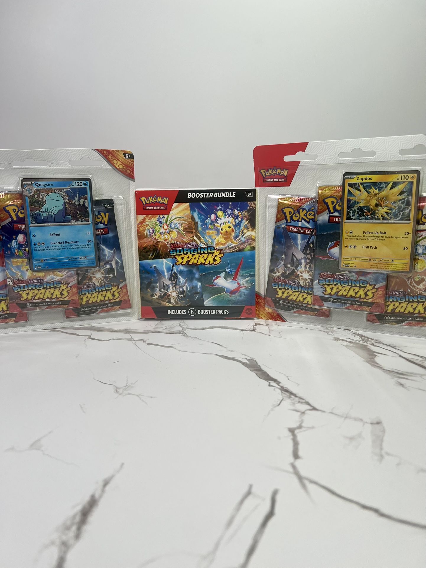 Pokemon Surging Sparks Booster Bundle + 2x 3pk Blister