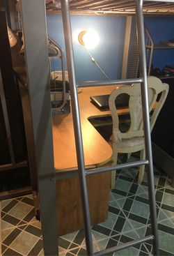 Full size bed on the top with desk on the bottom.