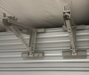 28 ft  type 2 ladder with adjustable legs and 2 new ladder jacks
