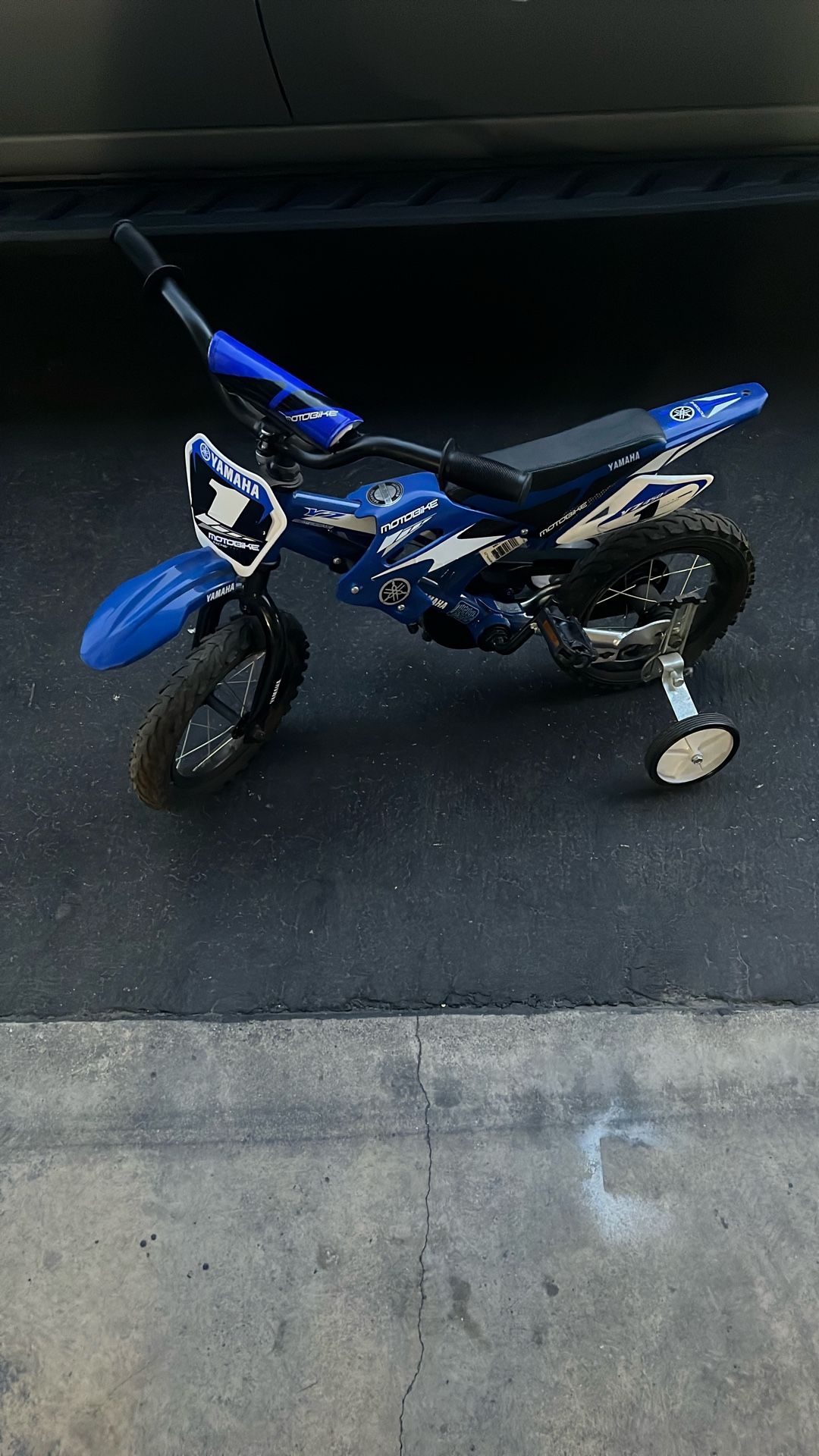A Yamaha Pedal Toddler Motorbike. Blue,white And Black Price Is 100$ But Can Make Are Way To A Price You Feel Comfortable With.