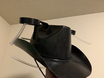Plastic cowboy hat with can holder