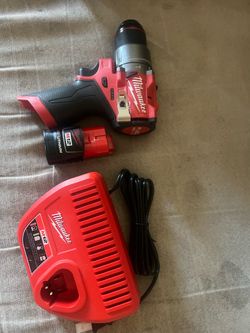 Milwaukee M12 Fuel Brushless Hammer Drill Battery and Charger