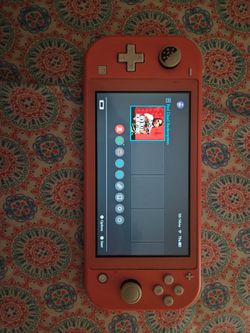 Nintendo Switch Lite Red Handheld Console, no charger/ with Red Redemption case and game card included.