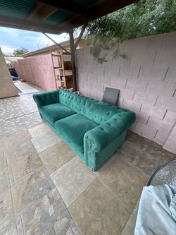 Green velvet sofa
