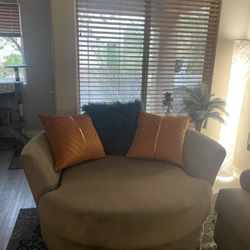 Gray oversized swivel chair
