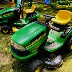 2 John Deere Lawnmowers