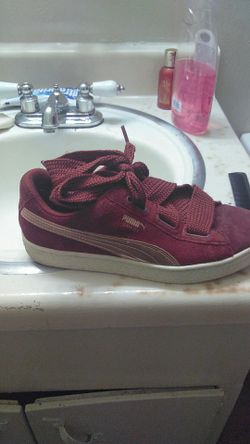 Burgundy pumas