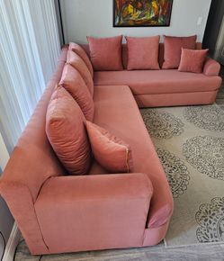 Like New! Large L-shaped sectional (2 pieces).
High-quality velvet/suede-like fabric with an iridescent finish.
Zippered back cushion covers; removabl