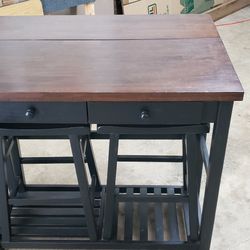 Bar Table With 2 Black Stools