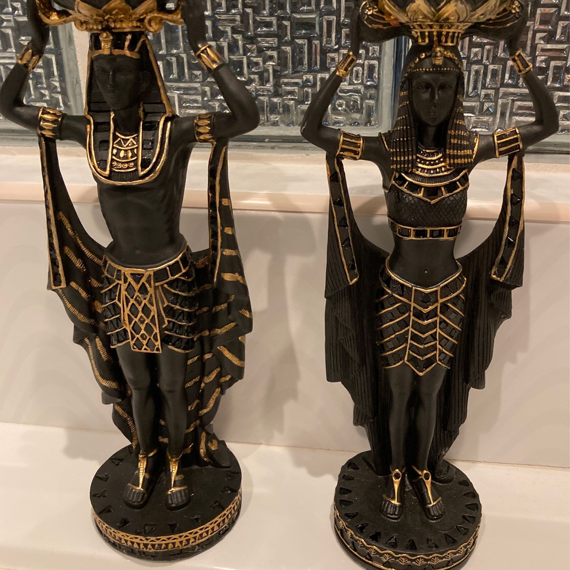 2 Egyptian candle holders Male & Female King Tut style. Bare nude chest w/ elaborate gold & black glass design. Pair