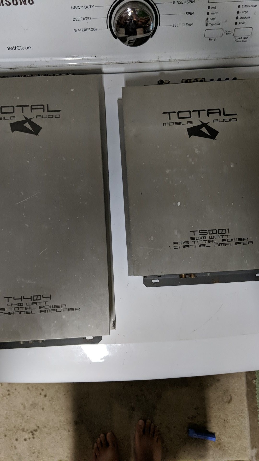Two Total Mobile Audio TMA amps made by JL Audio