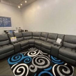 Going out of business sale. Madrid gray leather reclining sectional now $1599. Easy finance option. Same day delivery.