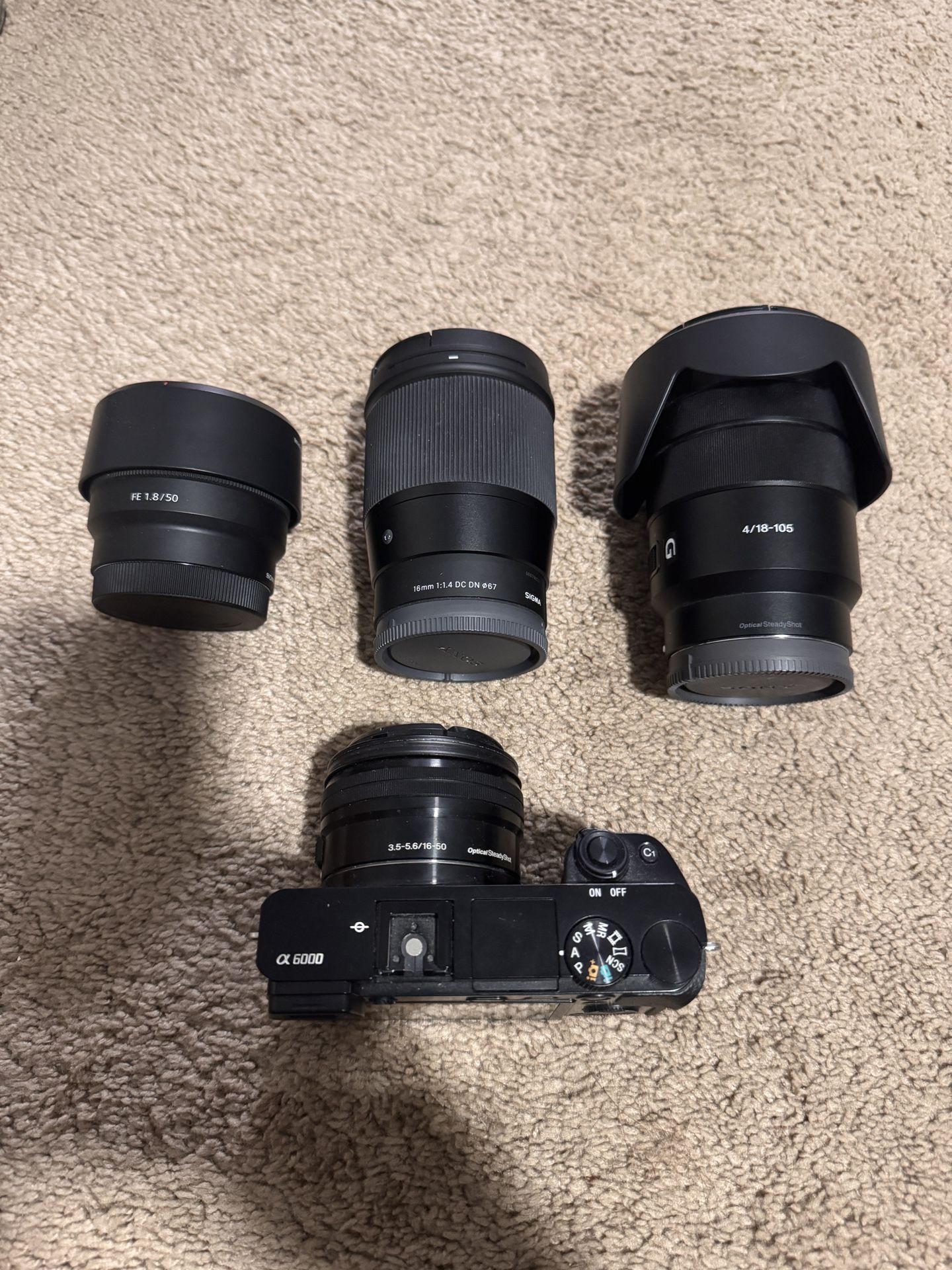 Sony A6000 With 16-50 Kit Lens, Sigma 16 F1.4, Sony 50 F1.8, Sony 18-105 F4