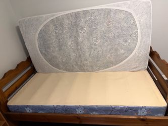 Twin bed with box spring and wood frame