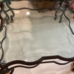 Cast-Iron Coffee Table With A Thick Glass Asking $800.