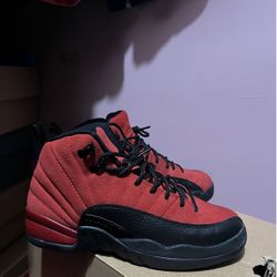 red and black jordan 12s 