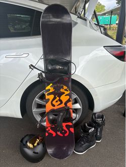 Burton Snowboard with boots and helmet