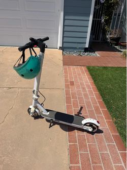 Electric Scooter + Helmet + Charger – Ready to Ride!
