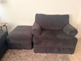 Dark blue sofa with matching ottoman plus oversized chair