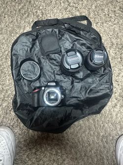 Canon D-3200 digital camera with 2 auto focus lenses