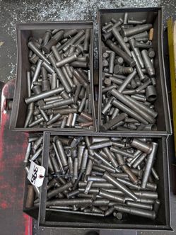 Large lot of hardened dowel pins