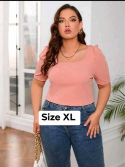 New women’s top size XL