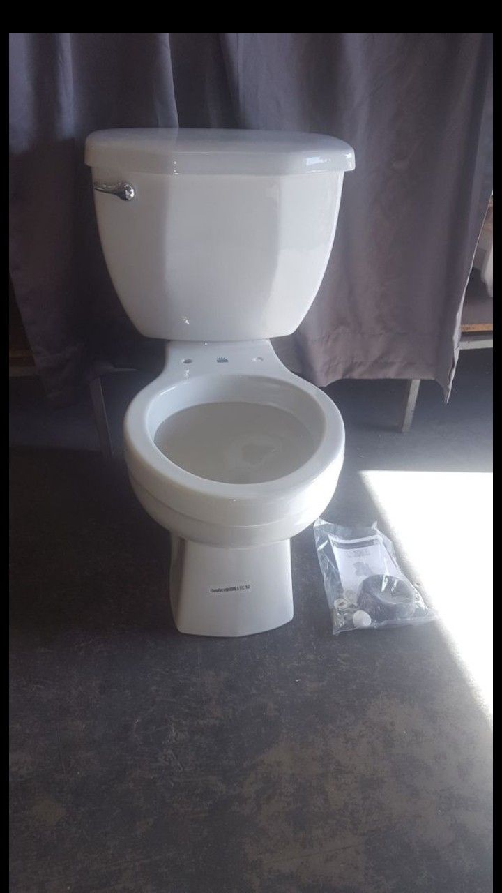 Niza Pro High Efficiency Round Toilet in White Brand New in the box
