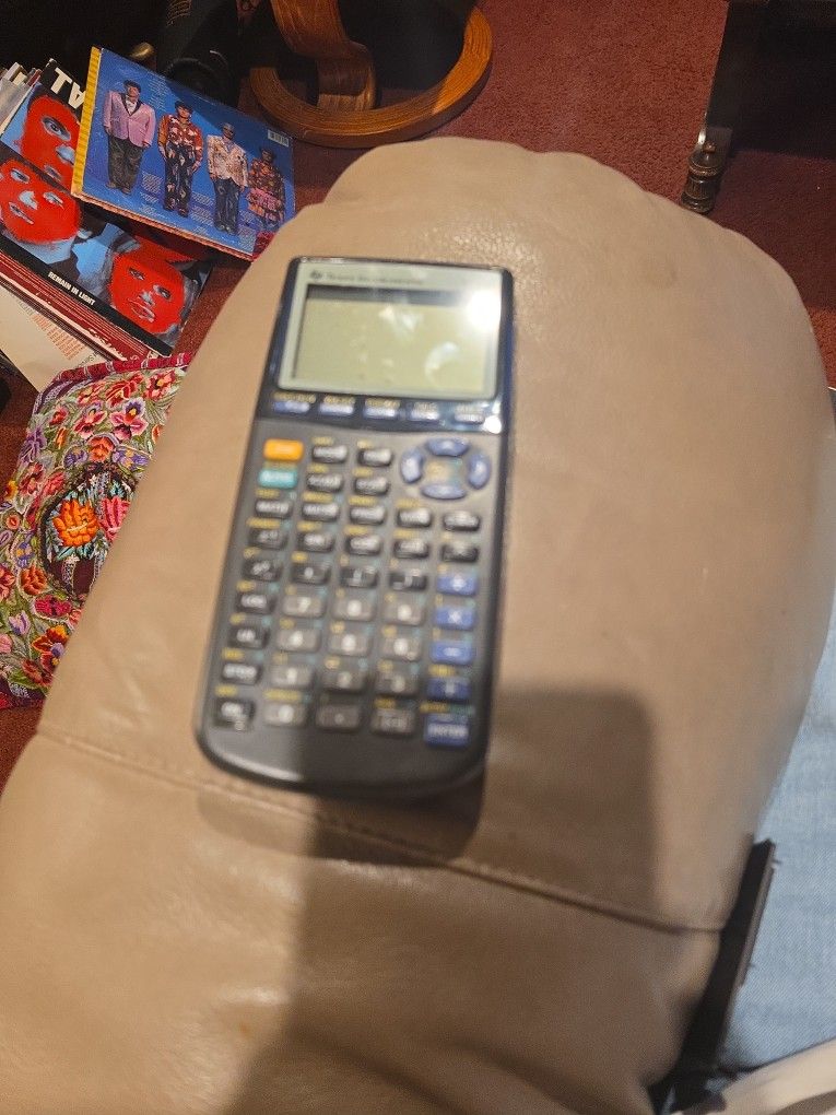 Texas Instruments Ti-83 Graphing Calculator
