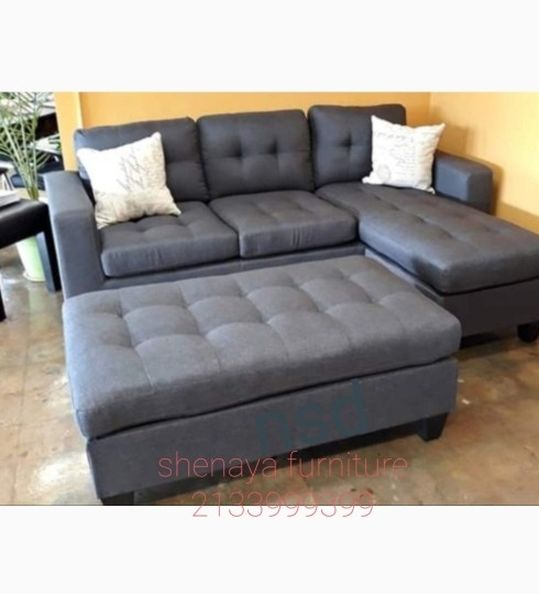 Gray Reversibke Sectional Sofa With Ottoman