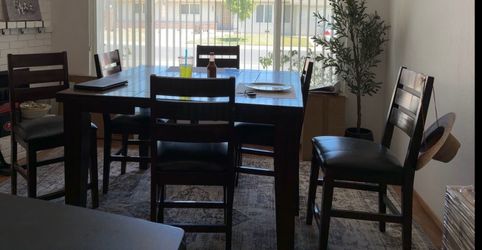 6 chair dining table , higher table