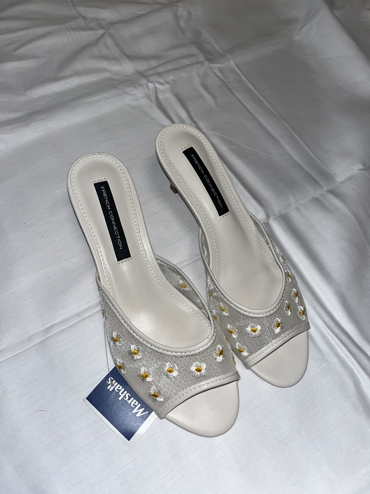 White and yellow floral heels